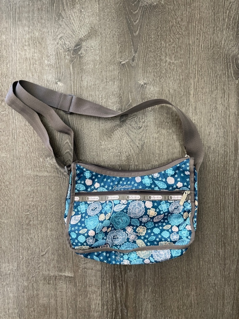 LeSportsac Classic Hobo crossbody bag blue floral doodle pattern.